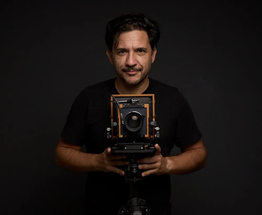 Julian Buitrago with a large format camera